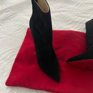 Christian Louboutin Red Bottom Boots.